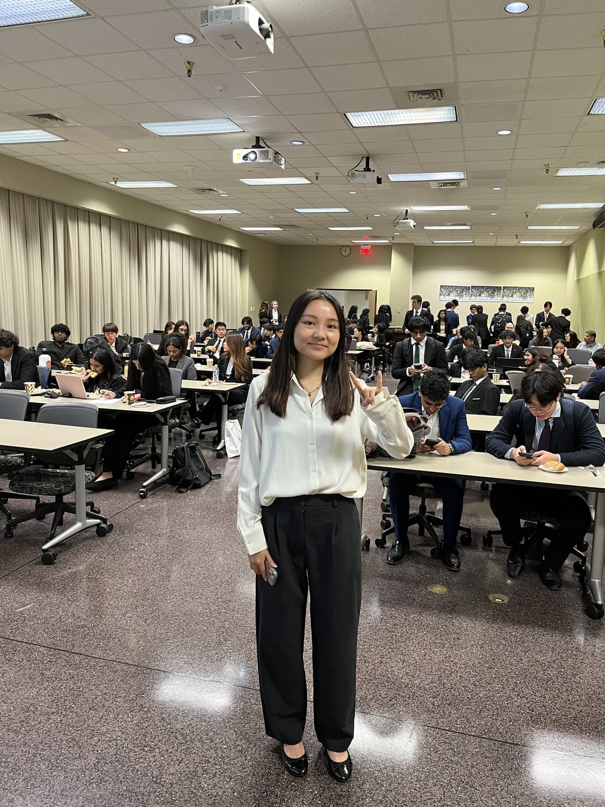 A MISA member leading a session in a full lecture hall